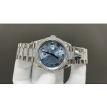 Sunday calendar series women's watch, ice blue dial, diamond-set bezel, 36mm, diamond-set silver President-style bracelet.
